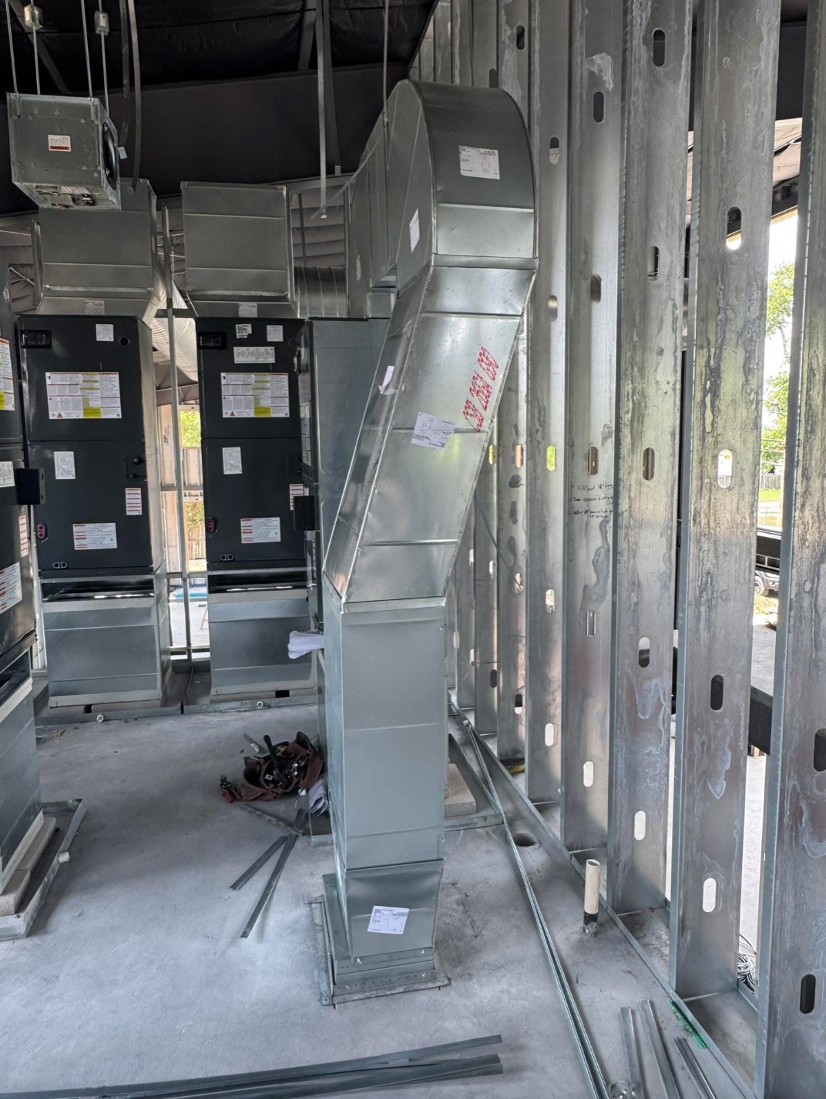 Sharp Air Mechanical service truck and van on a job site